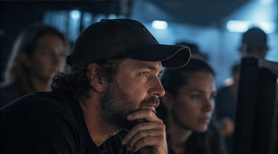 Director reviewing monitor